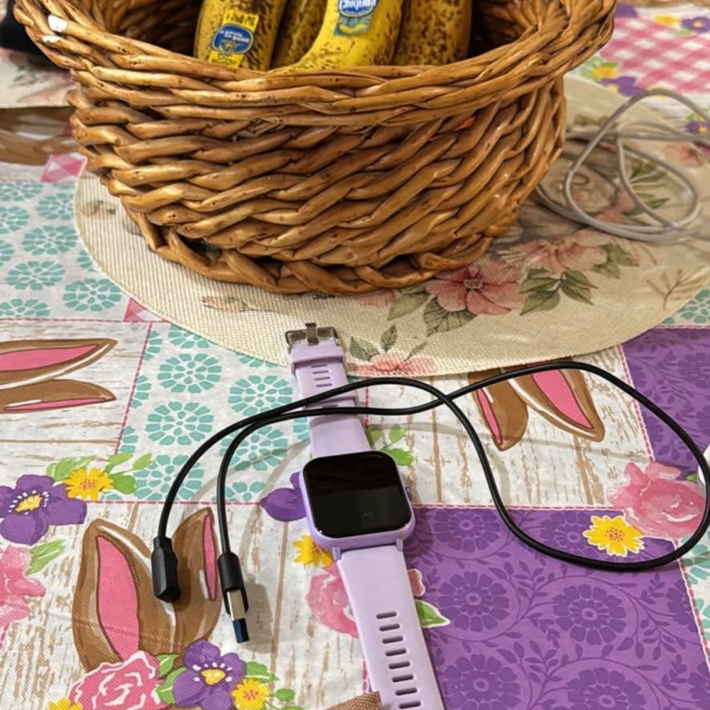 Purple Smartwatch with Charger